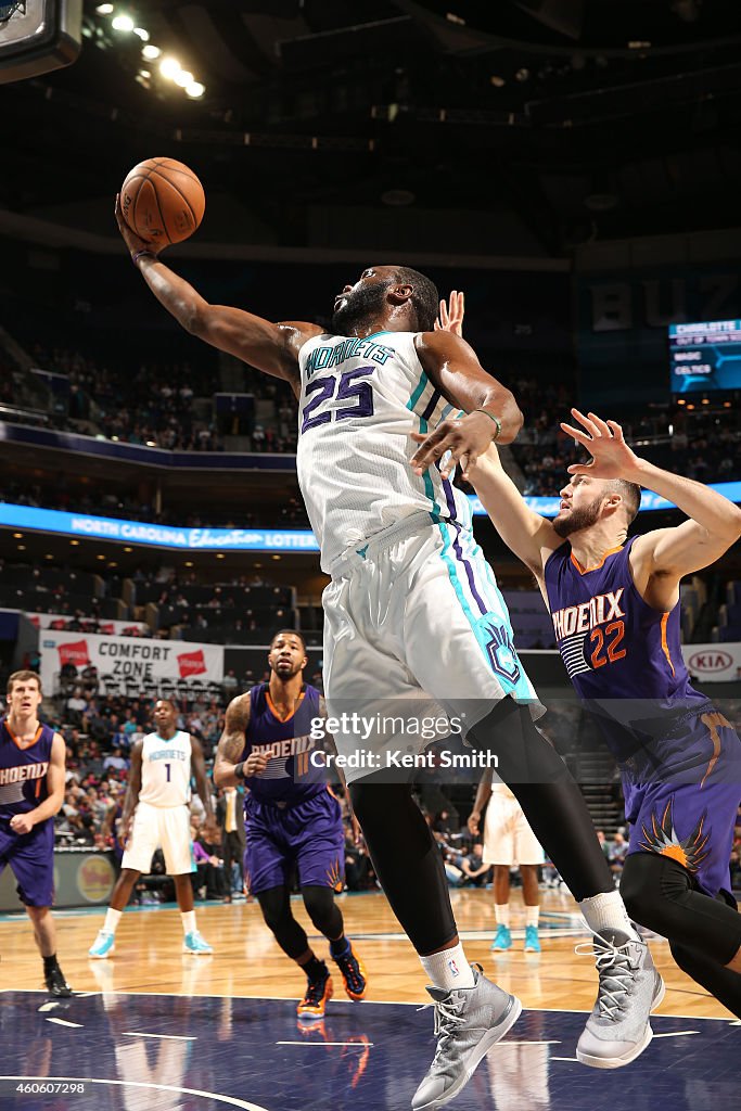 Phoenix Suns v Charlotte Hornets