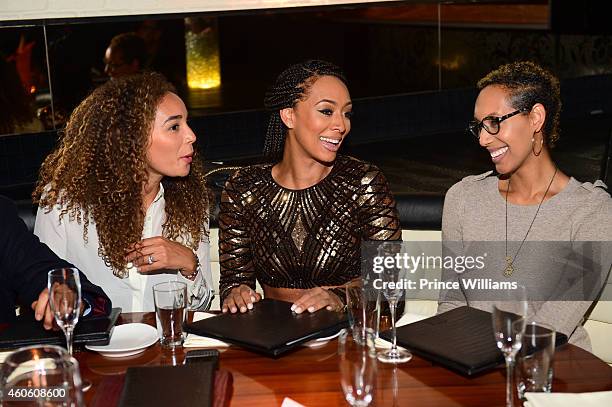 Bertille Sefolosha, Keri Hilson and Kaycee Hilson attend Keri Hilson's Birthday dinner at STK on December 8, 2014 in Atlanta, Georgia.