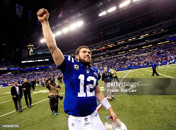 Quarterback Andrew Luck of the Indianapolis Colts celebrates after defeating the Kansas City Chiefs 45-44 in a Wild Card Playoff game at Lucas Oil...