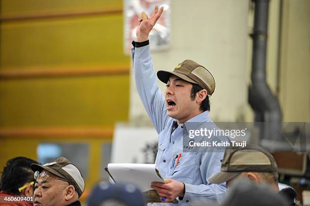 Auctioneer interacts with bidders on the year's first auction at Tsukiji Fish Market on January 5, 2014 in Tokyo, Japan. Tsukiji Fish Market is best...