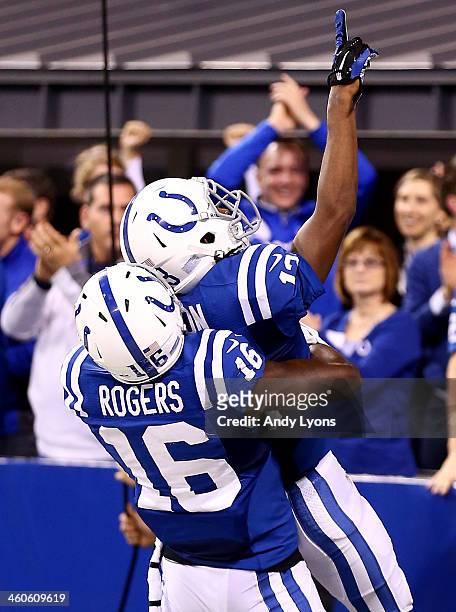 Wide receiver T.Y. Hilton celebrates a fourth quarter touchdown with wide receiver Da'Rick Rogers of the Indianapolis Colts against the Kansas City...