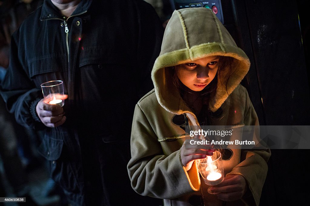 Candlelight Vigil Held For Pakistani School Children Killed In Taliban Terror Attack