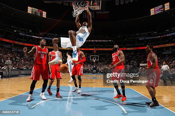 Kenneth Faried of the Denver Nuggets dunks the ball against the Houston Rockets at Pepsi Center on December 17, 2014 in Denver, Colorado. NOTE TO...