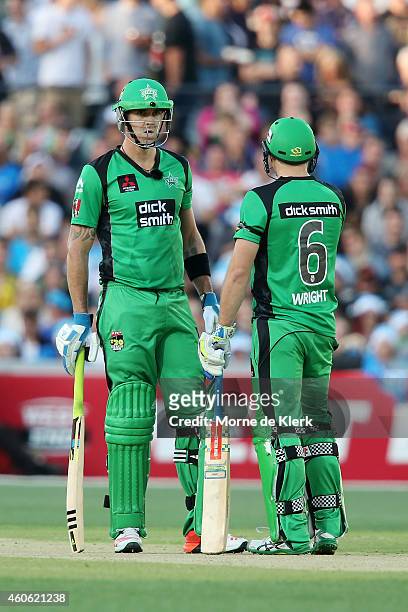 Kevin Pietersen and Luke Wright of the Melbourne Stars speak between the wickets during the Big Bash League match between the Adelaide Strikers and...