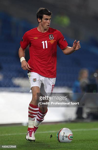 Gareth Bale in action for Wales during the EURO 2012 Group G Qualifier between Wales and Bulgaria at Cardiff City Stadium on October 8, 2010 in...