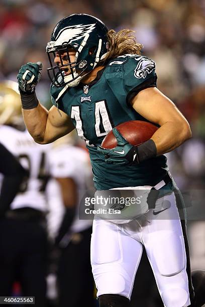 Riley Cooper of the Philadelphia Eagles celebrates after scoing a 10 yard touchdown thrown by Nick Foles in the second quarter against the New...
