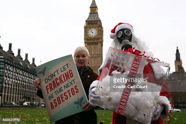Fashion designer Vivienne Westwood and her son Joe Corre pose for a photograph after delivering an anti-fracking letter at 10 Downing Street on...