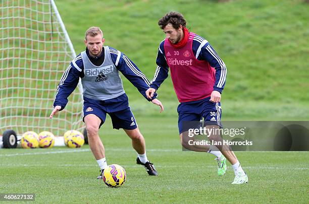 Lee Cattermole with Will Buckley during a Sunderland AFC Training Session at the Academy of Light on December 18, 2014 in Sunderland, England.