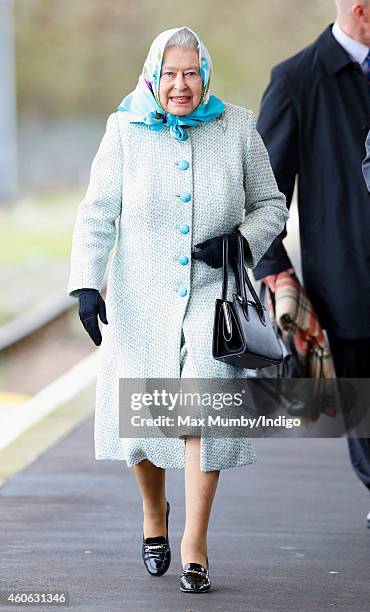 Queen Elizabeth II arrives at King's Lynn Railway Station, after taking the train from London King's Cross, to begin her annual Christmas break at...