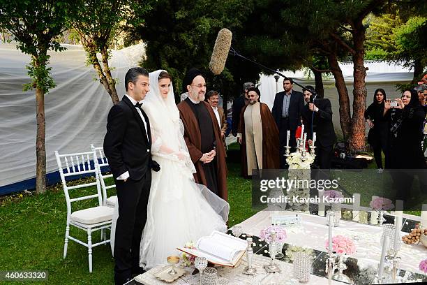 Parmis Taheri and Mostafa Aghaei make a souvenir photo with ex president Khatami after their wedding sermons at the social club of Mining & Industry...