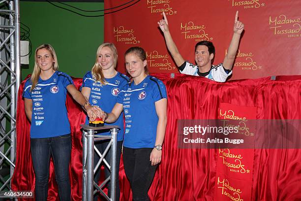 Pauline Bremer, Jennifer Cramer and Tabea Kemme and of the women's national football team of Germany unveil a wax figure of the multiple world player...