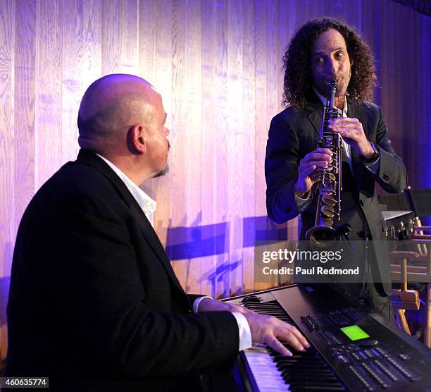 Songwriter Walter Afanasieff and musician Kenny G perform at ISINA collaboration announcement at Capitol Recording Studios Holiday Party at Capitol...