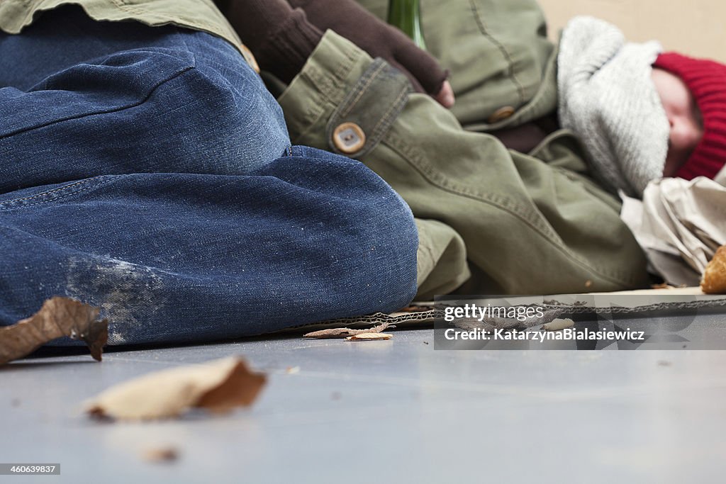 Homeless lying on the ground