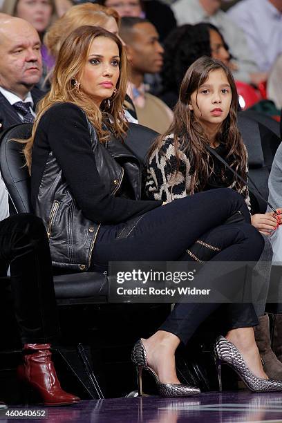 Aleka Kamila watches as her husband, Peja Stojakovic, has his jersey retired during haltime against the Oklahoma City Thunder on December 16, 2014 at...