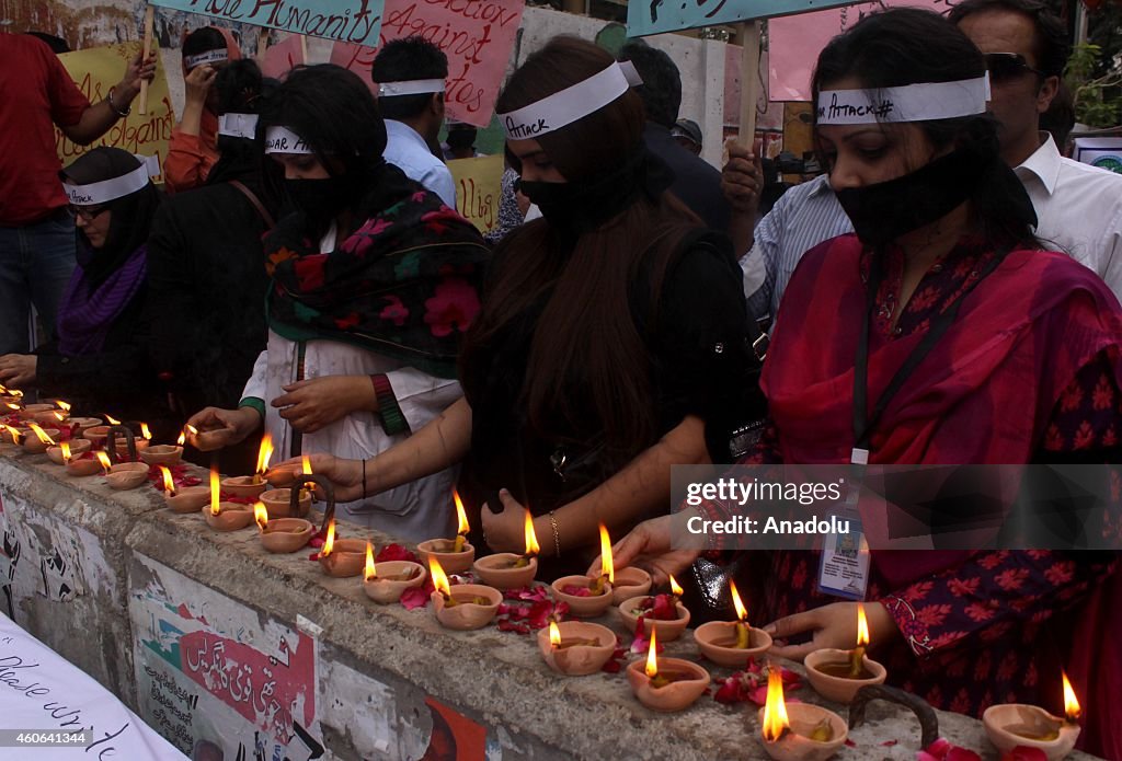 Candle vigil in memory of Taliban school attack victims in Pakistan