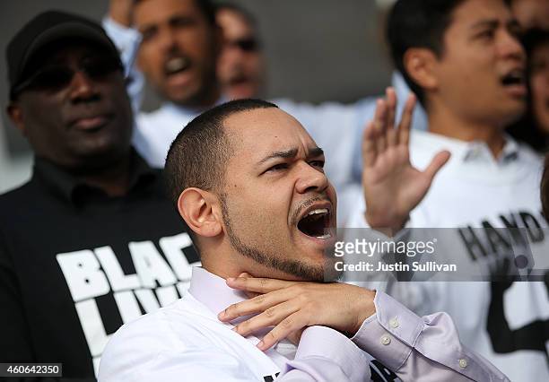 Protester chants "I can't breathe" during a "Hands Up, Don't Shoot" demonstration in front of the San Francisco Hall of Justice on December 18, 2014...