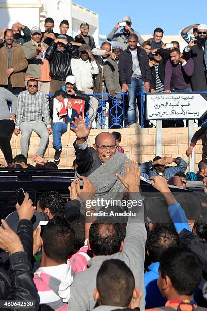 Tunisian presidential candidate Moncef Marzouki gives a speech as he meets with people as a part of his election campaign for the presidential...