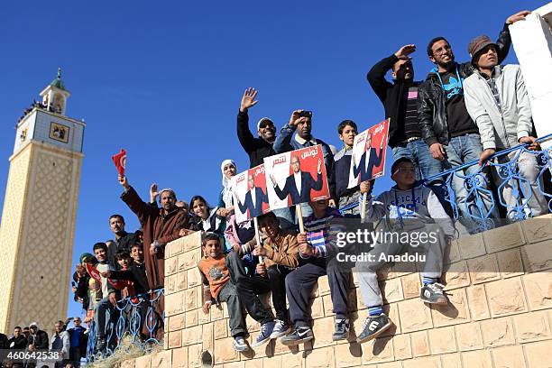 Tunisian presidential candidate Moncef Marzouki gives a speech as he meets with people as a part of his election campaign for the presidential...