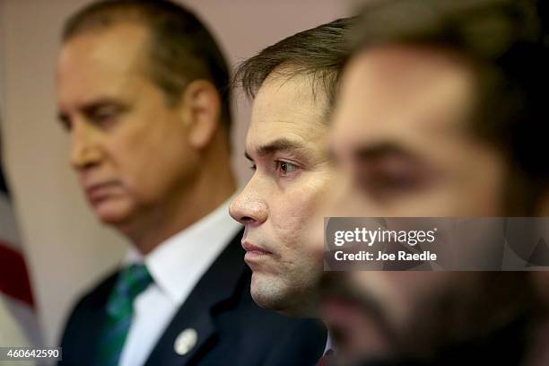 Sen. Marco Rubio waits to speak to the media as he is joined by other congressional people as they address the decision by President Barack Obama to...