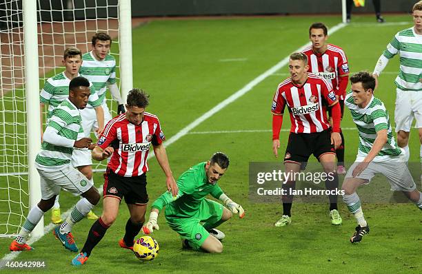 Thomas McNamee of Sunderland competes with Celtic keeper Leonardo Fassan during The Premier League International Cup match between Sunderland U21 v...