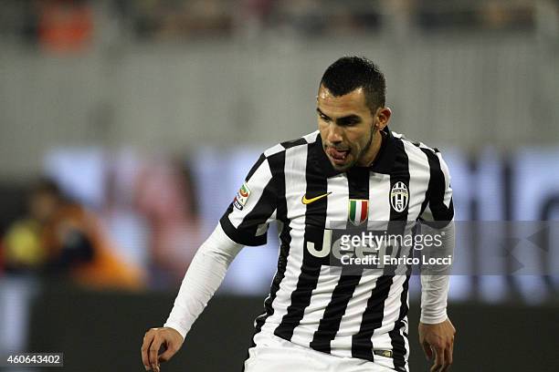 Carlos Tevez of Juventus in action during the Serie A match betweeen Cagliari Calcio and Juventus FC at Stadio Sant'Elia on December 18, 2014 in...