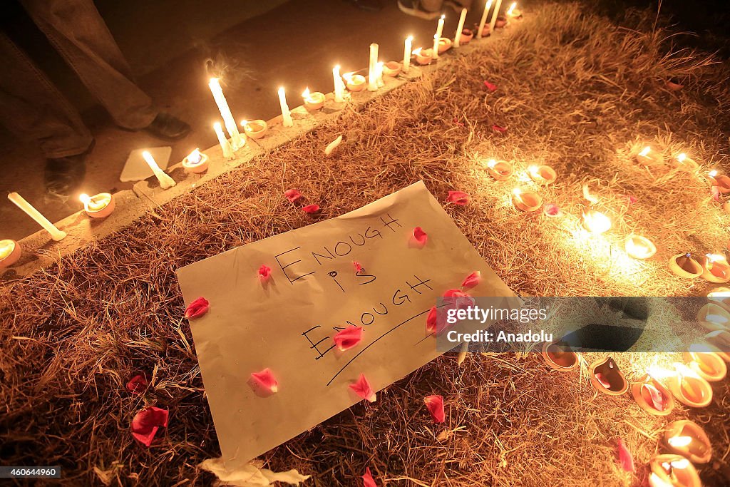 Candle vigil in memory of Taliban school attack victims in Pakistan