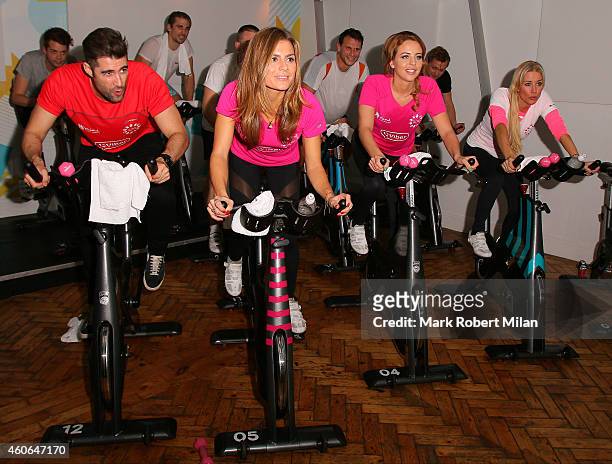 Matt Johnson, Zoe Hardman and Lydia Bright and Denise Van Outen take part in a charity Spin class at Psycle London on December 18, 2014 in London,...