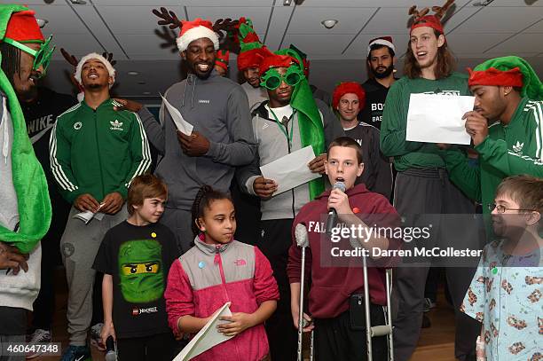 Todd sings along with Boston Celtics Gerald Wallace, Phil Pressey, Jeff Green, Marcus Smart, Darren Erman, Vitor Faverani, Kelly Olynyk, and James...