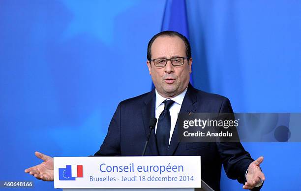 French President Francois Hollande delivers a speech during a press conference held after European Union summit at the EU headquarters in Brussels,...