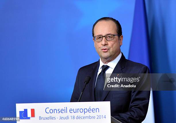 French President Francois Hollande delivers a speech during a press conference held after European Union summit at the EU headquarters in Brussels,...