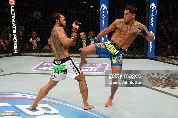 Anthony 'Showtime' Pettis kicks Benson Henderson in their UFC lightweight championship bout at BMO Harris Bradley Center on August 31, 2013 in...