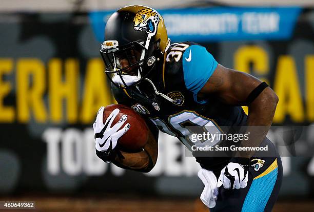 Jordan Todman of the Jacksonville Jaguars warms up prior to their game against the Tennessee Titans at EverBank Field on December 18, 2014 in...