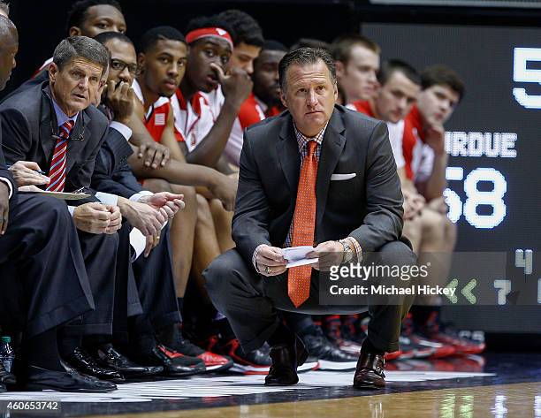 Head coach Mark Gottfried of the North Carolina State Wolfpack is seen during the game against the Purdue Boilermakers at Mackey Arena on December 2,...