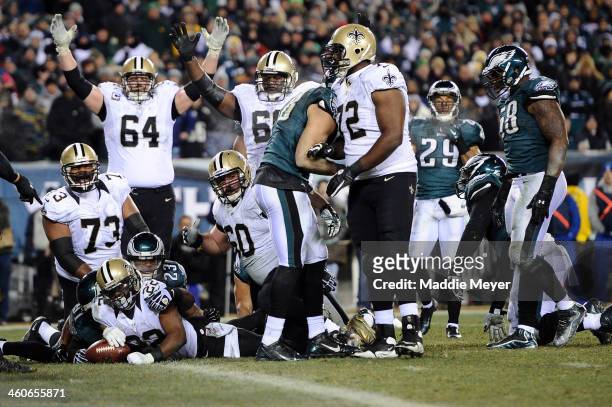 Mark Ingram of the New Orleans Saints runs for a 4 yard touchdown in the third quarter against the Philadelphia Eagles during their NFC Wild Card...