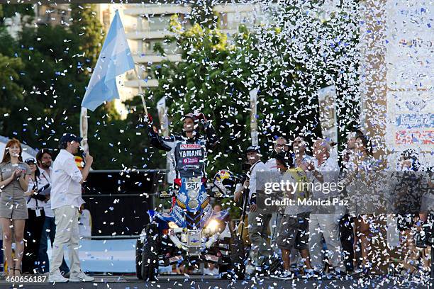 Argentinian competitor Marcos Patronelli rides his quad during the Symbolic Start of the Rally Dakar 2014 at the Flag Monument on January 04, 2014 in...