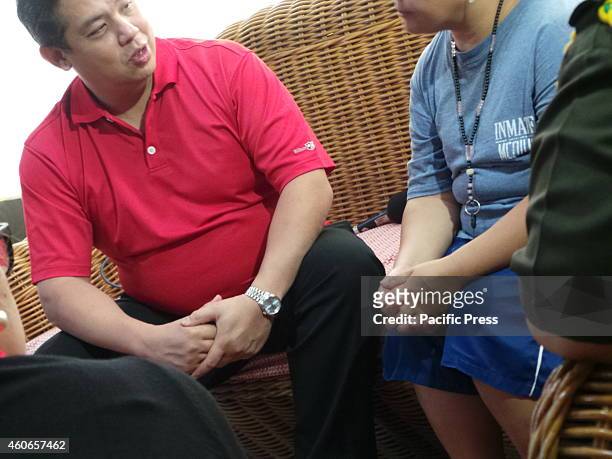 Hon. Ferdinand Romualdez speaking to inmate 'Rose' before the planned surprise reunion with her family that survived Typhoon Yolanda's devastation in...