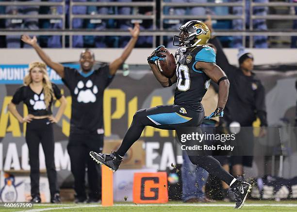 Jordan Todman of the Jacksonville Jaguars crosses the goal line on a 62-yard touchdown during the fourth quarter of the game against the Tennessee...