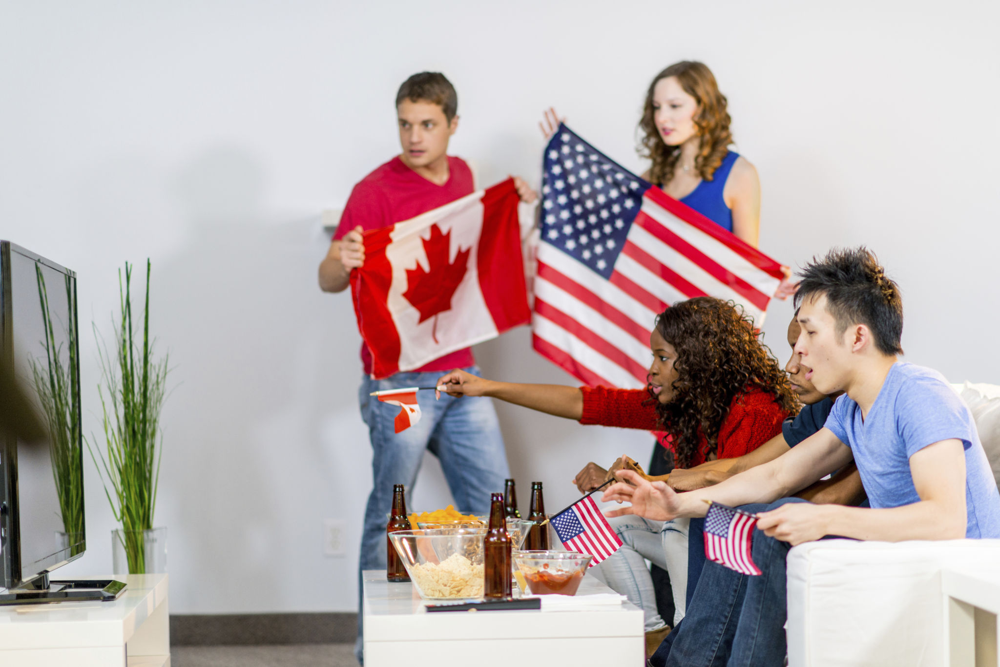 Young adults watching olympics Young adults watching olympics