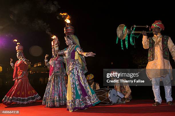 Traditional dancers perform for guest at the Rambagh Palace in Jaipur, a former residence of the Maharaja of Jaipur and now a luxury Hotel.