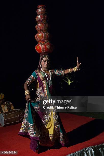 Traditional dancer performs for guest at the Rambagh Palace in Jaipur, a former residence of the Maharaja of Jaipur and now a luxury Hotel.