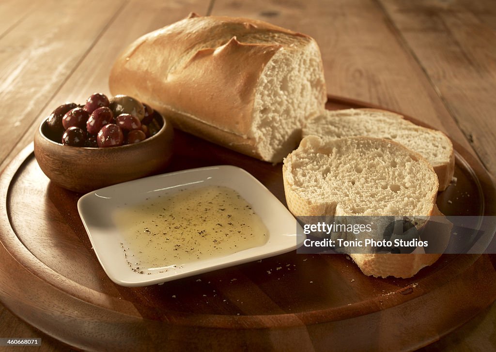 Bread and olives on tray
