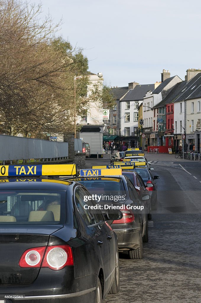 Taxis lined up on a Galway street