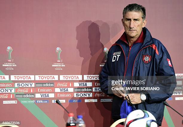 San Lorenzo's coach Edgardo Bauza arrives to give an official press conference during the FIFA Club World Cup at Marrakesh stadium in Marrakesh on...