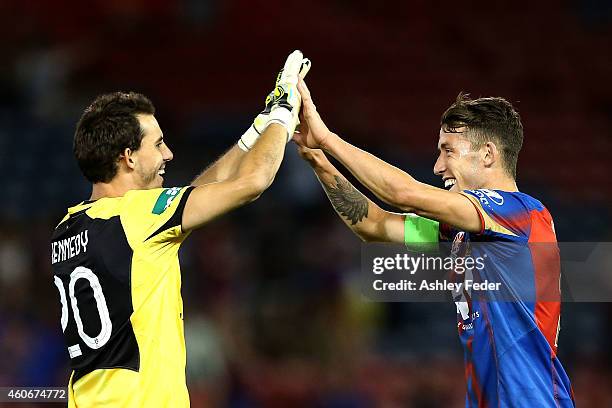 Ben Kennedy and Scott Neville of the Jets celebrate after winning the round 12 A-League match between the Newcastle Jets and Adelaide United at...