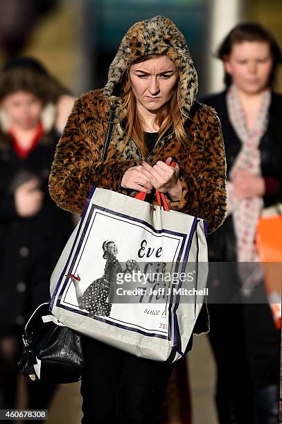 Shoppers look for Christmas gifts on the high street on December 19, 2014 in Glasgow,Scotland. With less than a week until Christmas, traditional...