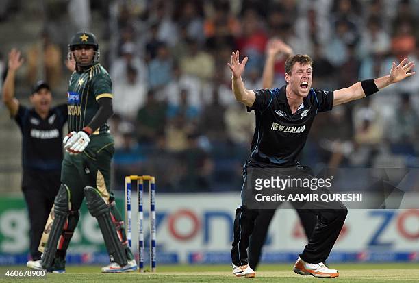 New Zealand bowler Matt Henry lauds a successful leg before wicket appeal against Pakistani batsman Nasir Jamshed during the fifth and final...