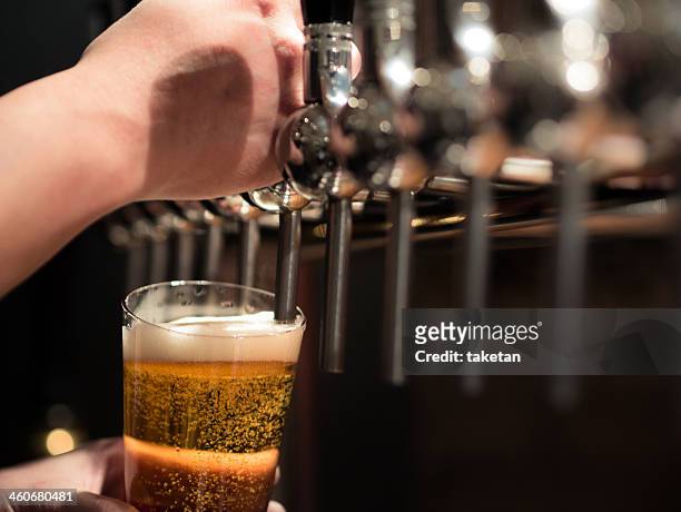 beer and taps - beer pump stock pictures, royalty-free photos & images