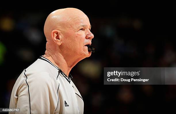 Referee Joe Crawford oversees the action between the Houston Rockets and the Denver Nuggets at Pepsi Center on December 17, 2014 in Denver, Colorado....