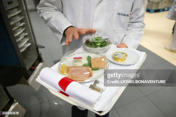catering workers prepare airplane food menu in... Airline Catering Photos and Premium High Res Pictures - Getty Images