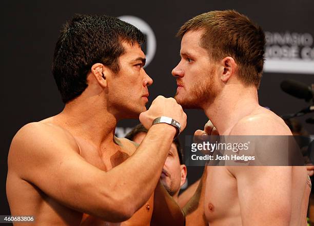 Opponents Lyoto Machida of Brazil and CB Dollaway of the United States face off during the UFC weigh-in event inside the Ginasio Jose Correa on...